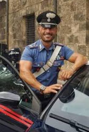 Another Italian policemen in light blue uniform. Oh my.