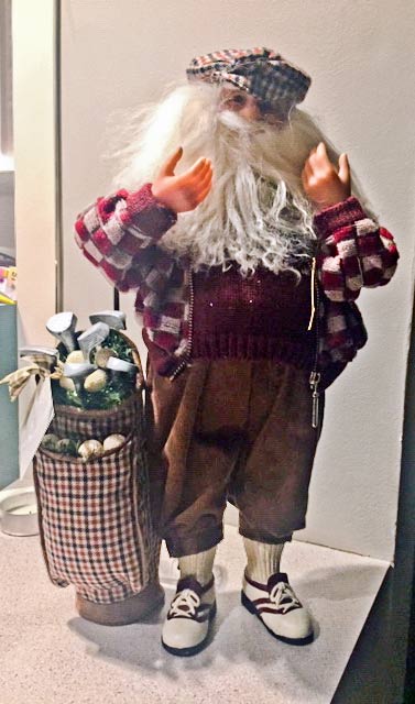 Santa dressed for golf